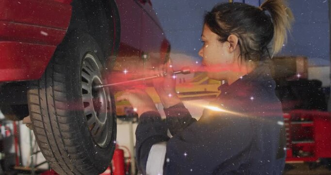 Vertical video: Female mechanic inserting breaker bar, loosening lug on lift with galaxy overlay
