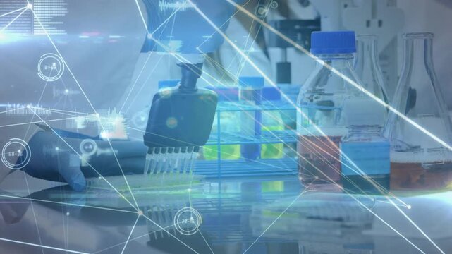 Lab tech using multi pipette lowering tips onto plate, loading assay wells with HUD tracking motion