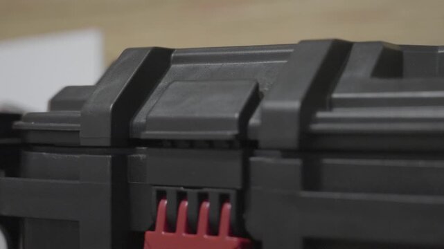 Open and unblocked hinge on a storage bin.