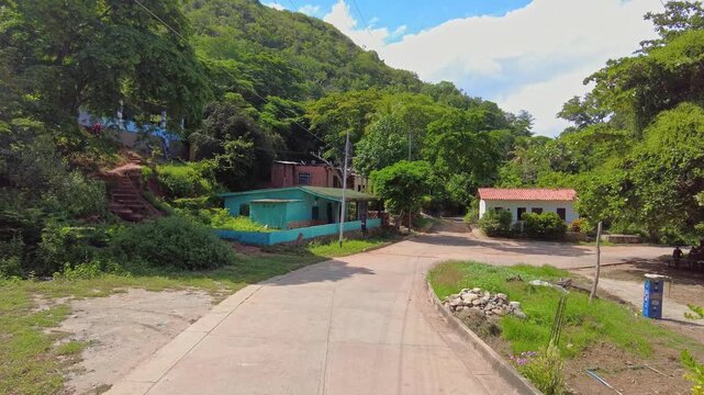POV tour of the small town of Chuao in Aragua State, Venezuela on a sunny day