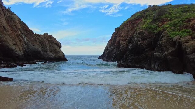Panoramic view of Puerto Escondido beach in Cepe Bay with light drizzle in Aragua State, Venezuela