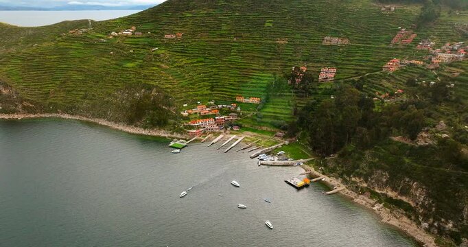Port village sits on Isla del Sol, Lake Titicaca, Bolivia. Aerial