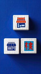 Three wooden blocks with store and Chinese character icons, blue backdrop