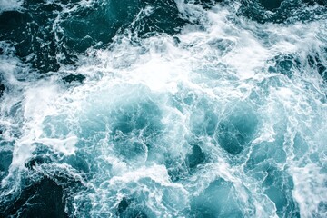 Fototapeta premium Close view of ocean waves crashing with motion and energy in coastal location at midday