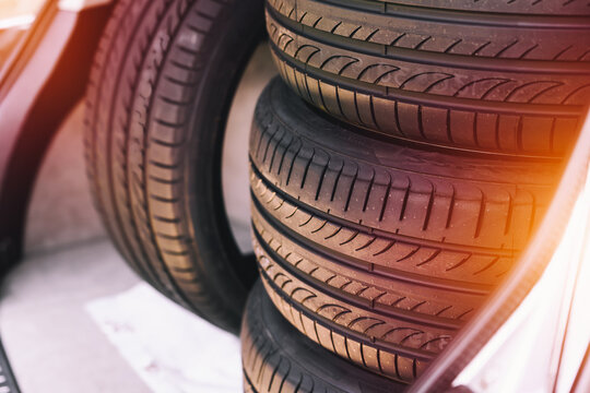 New car tires loaded in SUV trunk