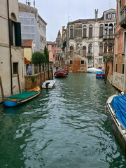Obraz premium Typical narrow canal with boats in Venice, Italy