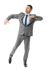 Businessman in pose of marionette on white background