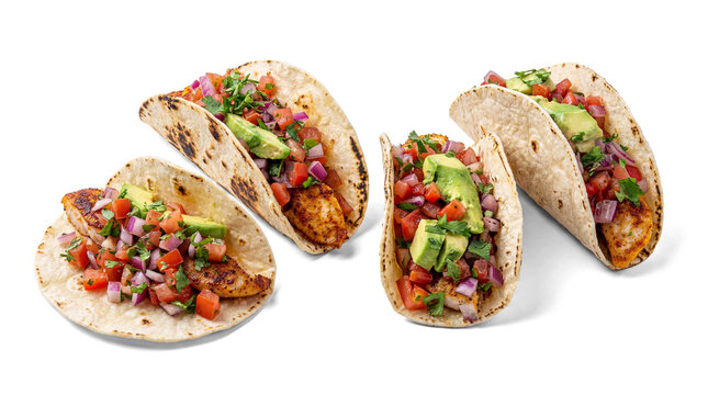 isolated image of grilled fish tacos with fresh pico de gallo and avocado, on a transparent background for versatile design use.