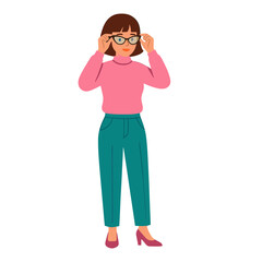 Woman putting on glasses in casual outfit standing still