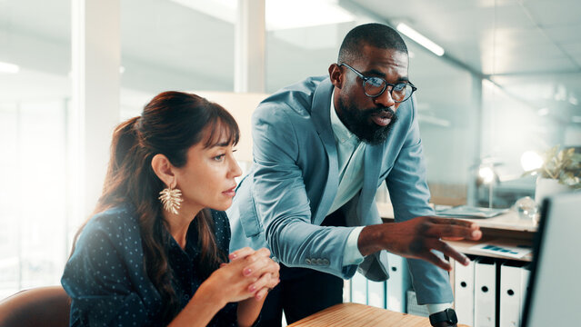Talking, planning or people with computer in office, investment opportunity or teamwork for proposal. Reading, risk assessment or staff with pc for shares yield forecast, collaboration or discussion
