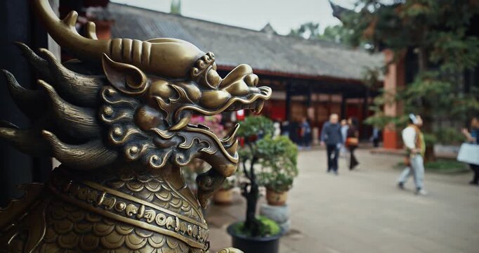 Chengdu, Sichuan, China. Bronze Lion Head Sculpture. Statue Of Mystical Chinese Guardian Lion. Head Of Golden Lion Statue At Wenshu Monastery. Sculptures Of Kylins Or Qilin. Kylins Is Mascot Dragon In