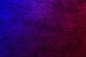 Fototapeta premium Neon lights on textured surface. Color gradient from red to blue