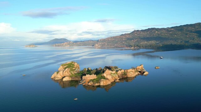 Panoramic View of Ancient Monastery Ruins on Bafa Lake Island at Dawn. High quality 4k footage