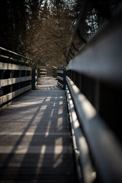 Wooden Pedestrian Bridge In Emmering Over Amper River: Perspective Walkway Between Olching And Fuerstenfeldbruck Near Munich