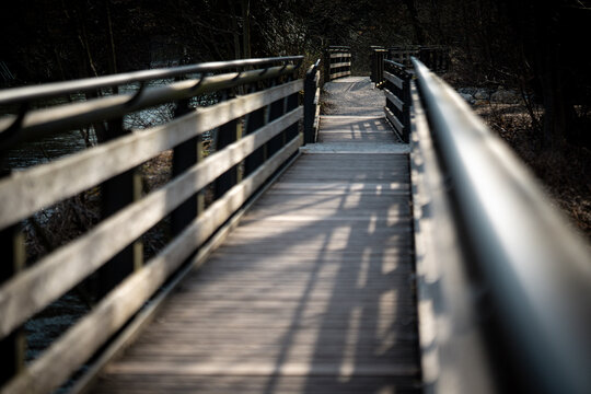 Wooden Pedestrian Bridge In Emmering Over Amper River: Perspective Walkway Between Olching And Fuerstenfeldbruck Near Munich