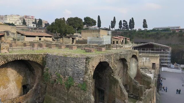 Villas of ancient Herculaneum, the Roman city destroyed by the eruption of Mount Vesuvius in AD 79, featuring preserved architecture and historic ruins near Naples, Italy.
