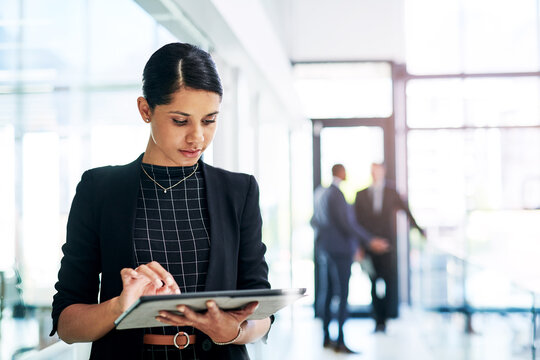 Reading, woman or scroll on tablet in office for legal research, court system or electronic filing. Staff, paralegal or browsing on tech at firm for evidence report, case preparation or policy review