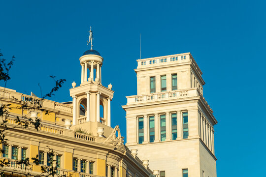 Historic architecture in Placa de Catalunya Barcelona on a sunny autumn day