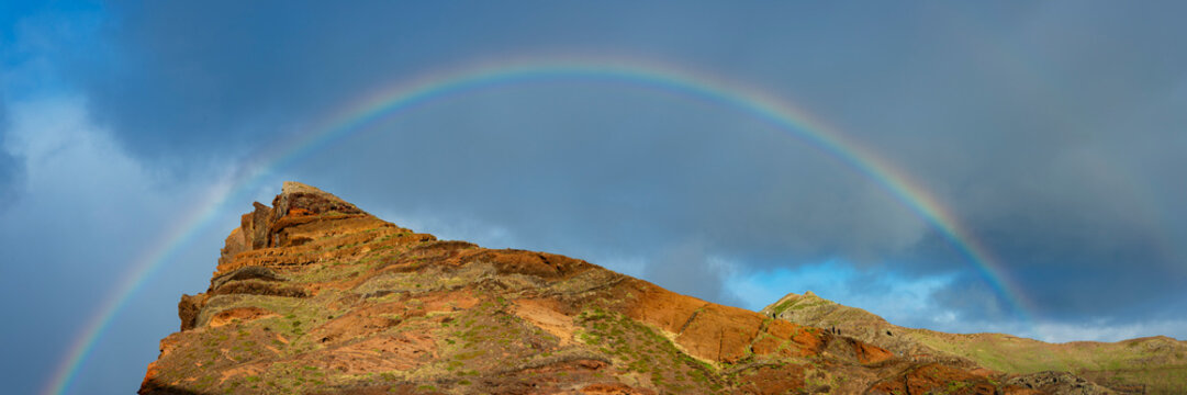 Rainbow over volcanic cliffs at Ponta de Sao Lourenco Madeira