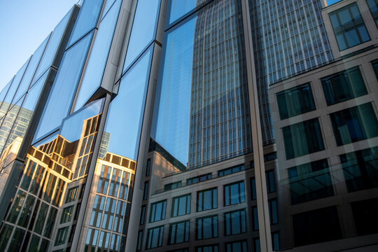 Modern office finance skyscraper in Frankfurt Germany with glass reflection and urban architecture highlighting corporate tower presence in financial district
