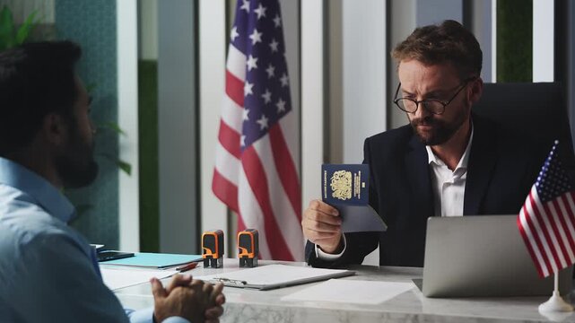 U.S. embassy employee approving application, handing U.K. passport to applicant
