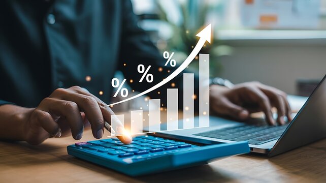 Hand pressing calculator buttons with rising bar graph and arrow showing positive financial performance trend