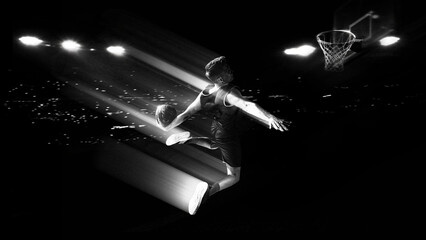 Basketball player performing slam dunk with light trail motion effect under arena lights used for basketball advertising, sports promotion and competition campaigns. © master1305