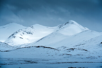 Snowy mountain and winter remote wilderness in Kyrgyzstan