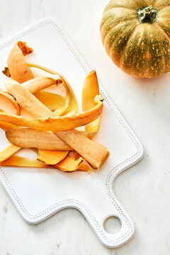 Pumpkin peels on a white plate