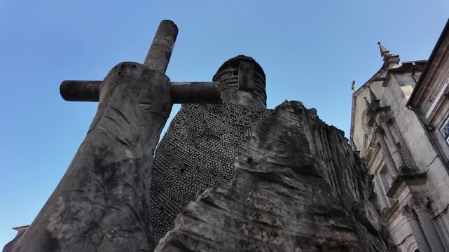 Guimaraes city monuments Dom Afonso henriques statue in the historical city center. Gimbal shot