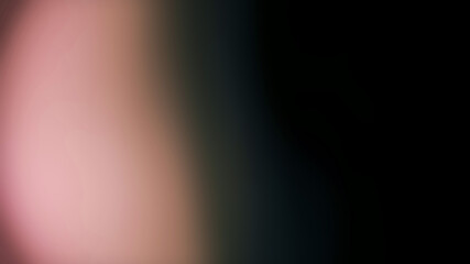 Fototapeta premium Subtle background gradient featuring soft pastel pink blending into dark moody charcoal tones creating an abstract light leak effect for artistic design projects