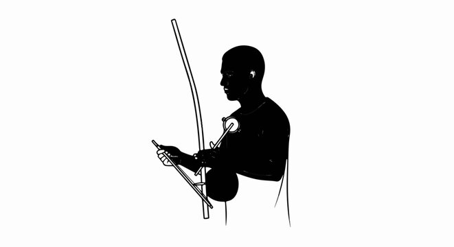 Silhouette of a person playing a berimbau instrument