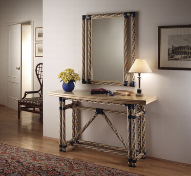 Single shot photo of a room with a rattan console table and mirror