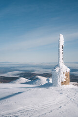 San lorenzo peak summit marker covered in rime ice