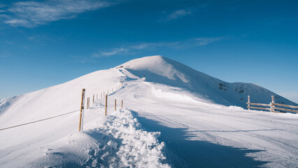 San lorenzo peak ski mountaineering track on a sunny winter day