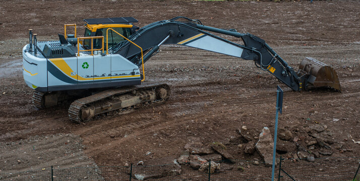 Powerful Crawler Excavator Working on Large Construction Site
