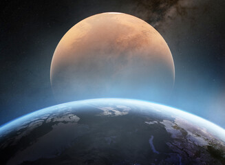 Fototapeta premium Mars rising above the horizon of Earth in deep space. Dramatic view of the red planet over Earth with visible atmosphere, stars and the Milky Way.. Elements of this image furnished by NASA.