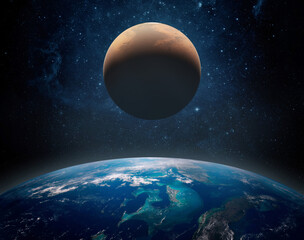 Naklejka premium Mars rising above the horizon of Earth in deep space. Dramatic view of the red planet over Earth with visible atmosphere, stars and the Milky Way. Elements of this image furnished by NASA.