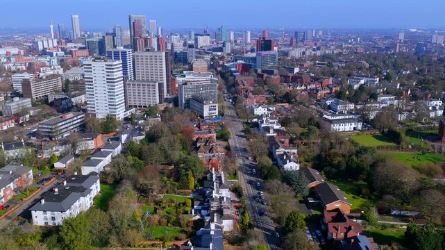 Aerial video of Edgbaston Village toward Birmingham city skyline.