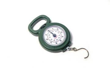 portable analog hanging scale, commonly used for weighing luggage, fish, or small parcels, isolated on white background © awgraphoto