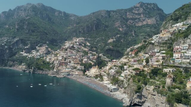 Positano on the Amalfi Coast in southern Italy, colorful cliffside houses above the Tyrrhenian Sea creating iconic Mediterranean travel destination. Aerial View reveals dramatic coastal landscape