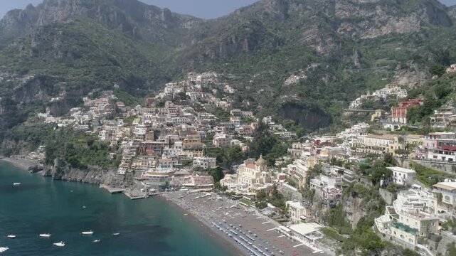 Positano on the Amalfi Coast in southern Italy, colorful cliffside houses above the Tyrrhenian Sea creating iconic Mediterranean travel destination. Aerial View reveals dramatic coastal landscape