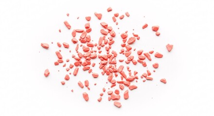 Coral crushed powder scattered on white background abstract