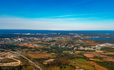 Obraz premium Aerial view of Muuga Port, Maardu Lake and Iru power plant.