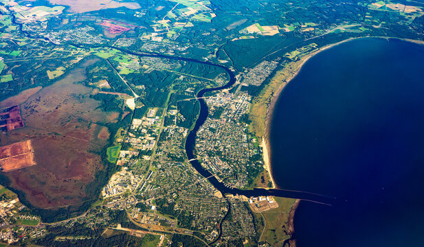 Aerial view of Parnu city with river and coastline in Estonia.