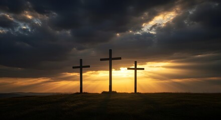 Obraz premium Wooden Crosses on Calvary Hilltop at Sunset with Dramatic Storm Clouds
