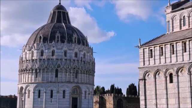 Pisa. Italy,Piazza dei Miracoli, listed among the UNESCO World Heritage Sites since 1987, is where you can admire the four monuments that form the centre of the city's religious life, called miracles
