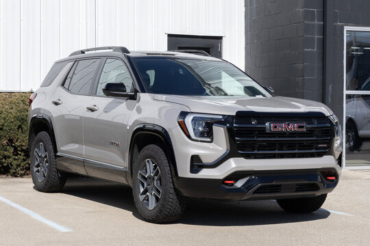 GMC Terrain AT4 AWD Small SUV display at a dealership. GMC offers the Terrain with a 1.5L Turbocharged engine. MY:2026