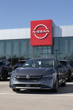 Nissan Sentra SL Compact Sedan display at a dealership. Nissan offers the Sentra with a 149HP 2.0L 4-Cylinder engine. MY:2026
