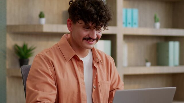 Caucasian business man work laptop in office businessman male guy working typing computer smiling happy with online job at table employer manager chatting with client with internet smile specialist